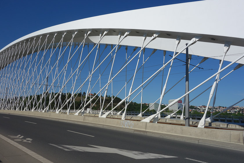 The ends of the arch are connected by two 
