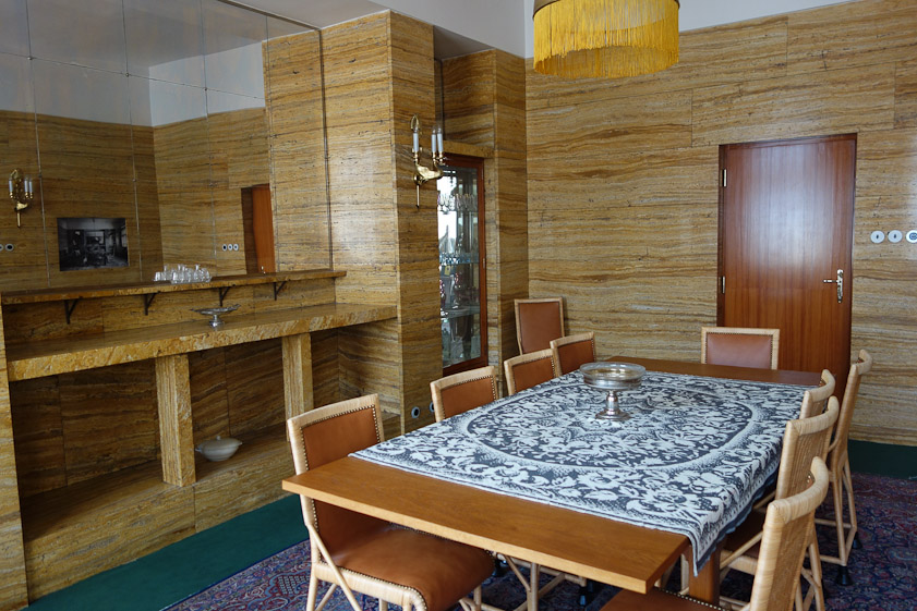The dining room of the Vogel's apartment was lined in travertine.