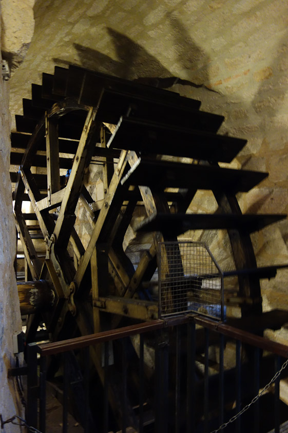 Our route took us under the water tower, where this wheel was located. Its only function, given the shape of the paddles, would be power generation. Perhaps an underground stream powered a pump to raise water to tanks in the tower.
