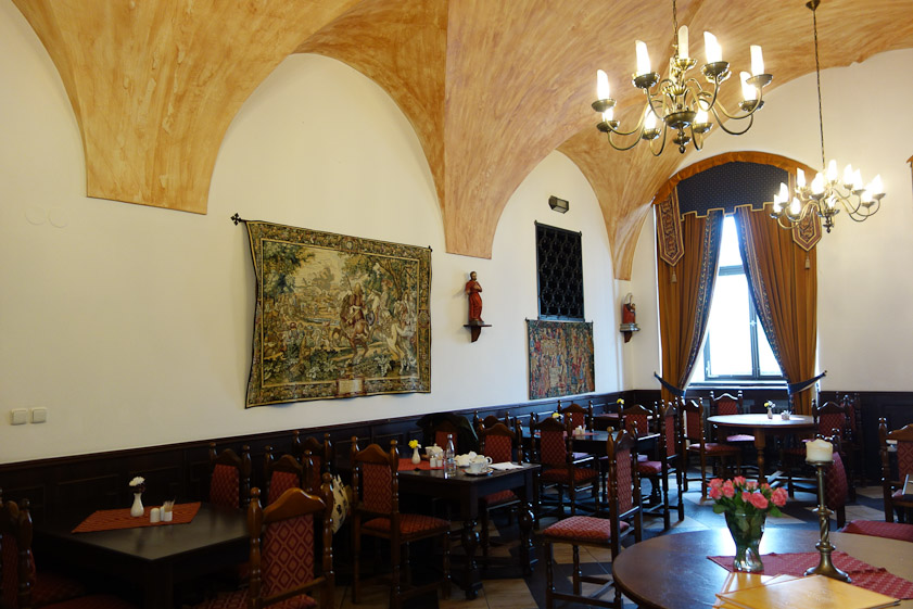 After visiting part of the regional musuem, we ate lunch across the street  in the grand Hotel Ruze. This was the best part of our visit. We were put off by the bus station, the rain, and by the large number of tourist groups in town.