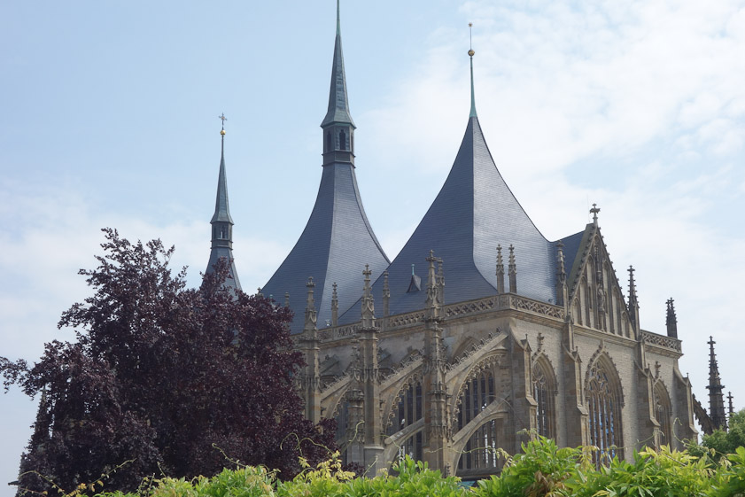 The wonderful tent roofs were replaced by the Jesuits but restored in the 19c. The kink visible in the ridge closest to the camera is probably due to the additional 19c bay.