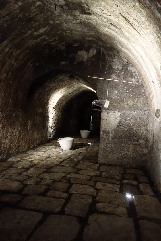 The catacomb-like room now has bowls into which water drips. It's part of  