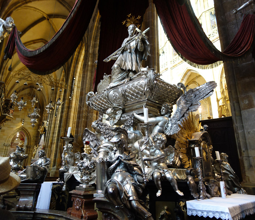 This extravagant Baroque altar of St.  John Nepomuk crowds the south ambulatory. It was designed by Josef E. Fischer von Erlack in 1736.