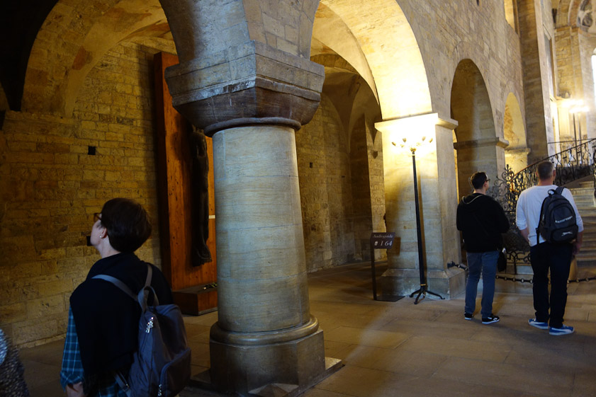 These short Romanesque pillars contrast with the much taller Gothic columns of St. Vitus.