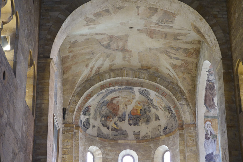 The apse frescos are fragmentary.