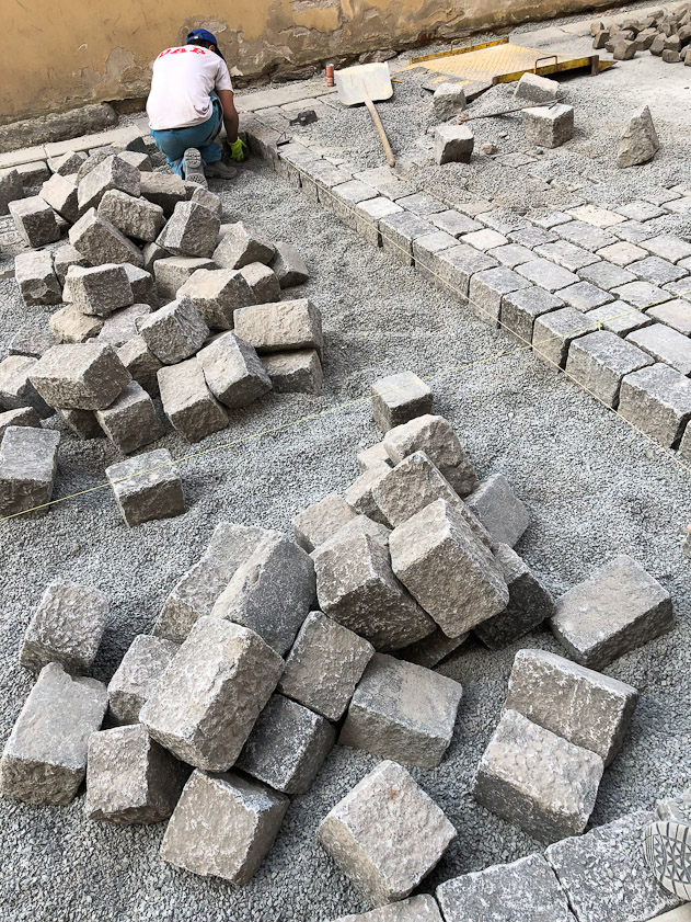 At least some streets are still paved in cobble stones, probably for their looks. They're not easy to walk on, though, especially the older, rougher ones.