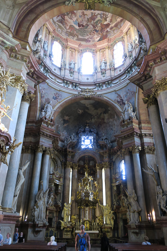 The large dome is close to the east end of the church. The guide handed out at the entrance reads 