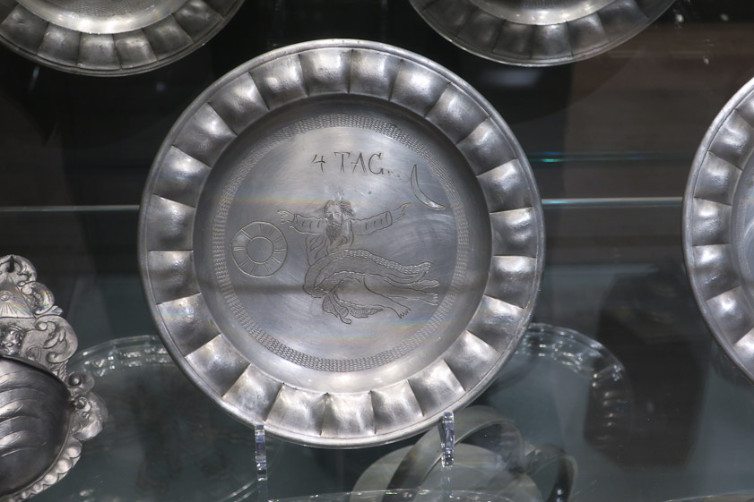 Karlovy Vary was a center for production of pewter in the 17c until the market disappeared. This is one of a set in the museum showing the Creation. On the fourth day God created the Sun, the Moon and the stars.