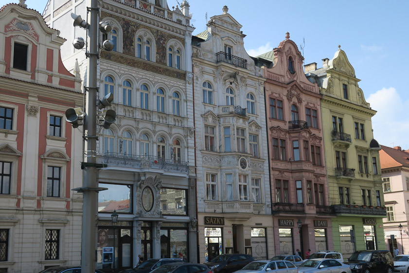 Houses on the west side of Republican Square facing the west end of St. Bartholomew. The pink building at far left is the Archbishop's residence.