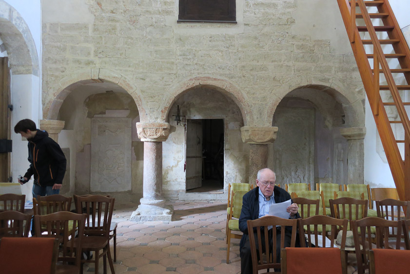 I'm reading the 3-page English handout in front of the balcony from which the nobles could observe services.