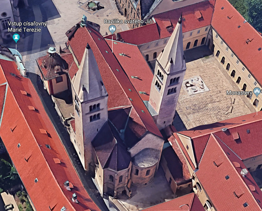 The chapel of St. Ludmilla has a black roof at bottom left. The crypt is to its right. The Chapel of St. John Nopomuk is at upper left.