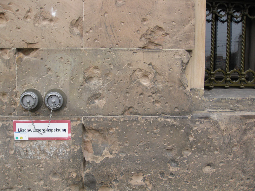 This building facing Museum Island still shows pitting from fragments and bullets fired during the battle for Berlin at the end of World War II.