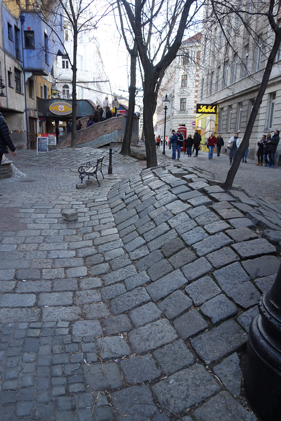 His work features uneven surfaces...
