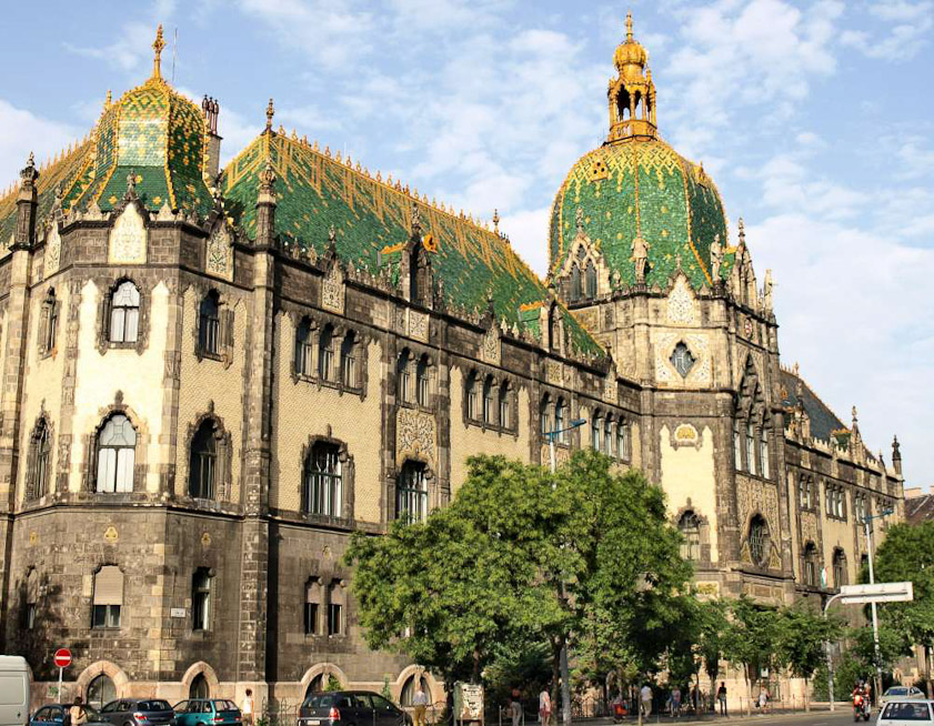 ... I downloaded a better photo from Wikipedia. The exterior when we were there was obscured by fencing put up during building renovation. The striking feature is the colored tile on the roof and dome, made by Zsolnay Porcelánmanufaktúra Zrt (Zsolnay Porcelain Manufactory Private Limited).
