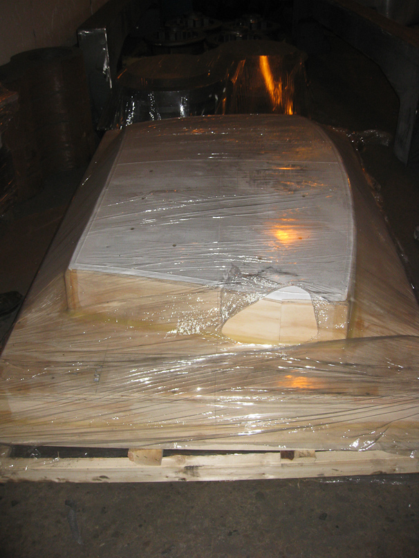 Some patterns are made by the foundry carpentry shop. This pattern was supplied by the customer, and is the shape of a Mercedes windshield. Hot glass will be draped over the iron casting made by Erhart to make windshields of the precise dimensions required to fit on a Mercedes.