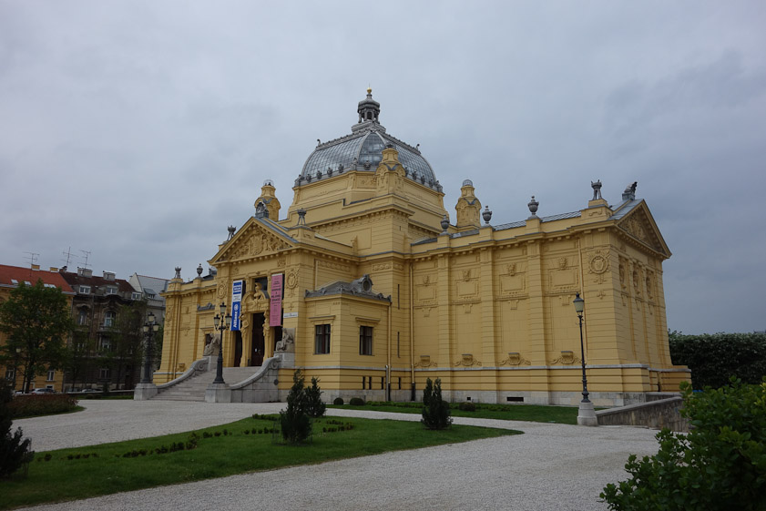 The Art Pavilion is across the street from Pivnica Tomislav. It was  built to display Croatian art at the 1896 Magyar millennium exhibition in Budapest. It was disassembled and moved to this location after the exhibition.