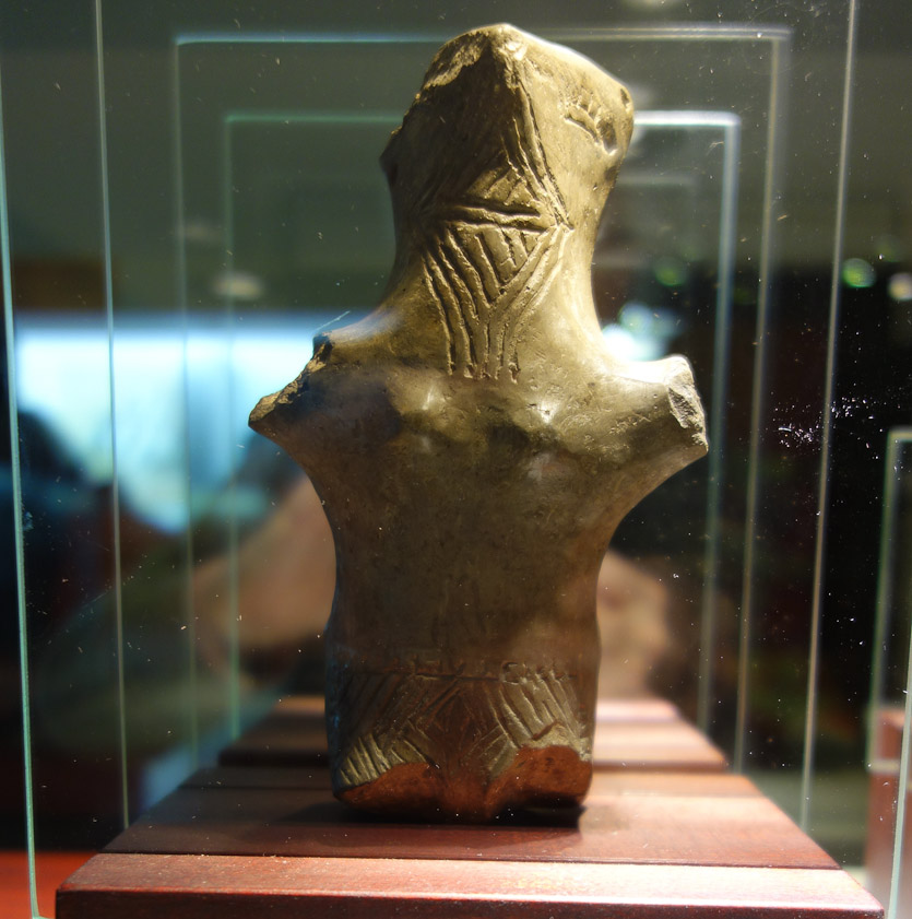 Another torso figure