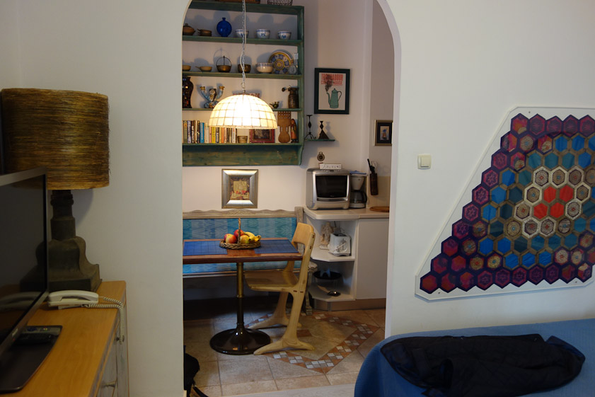 Round the corner is the kitchen and bathroom.