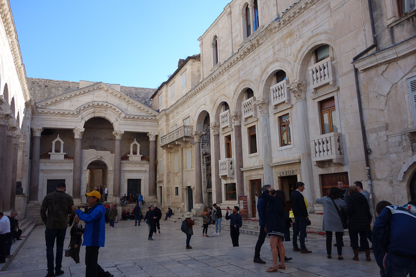 Two medieval palaces encroach on the Peristyle. Between them is a collapsing passage to a temple, mistakenly called the Temple of Jupiter, now a Baptistry.