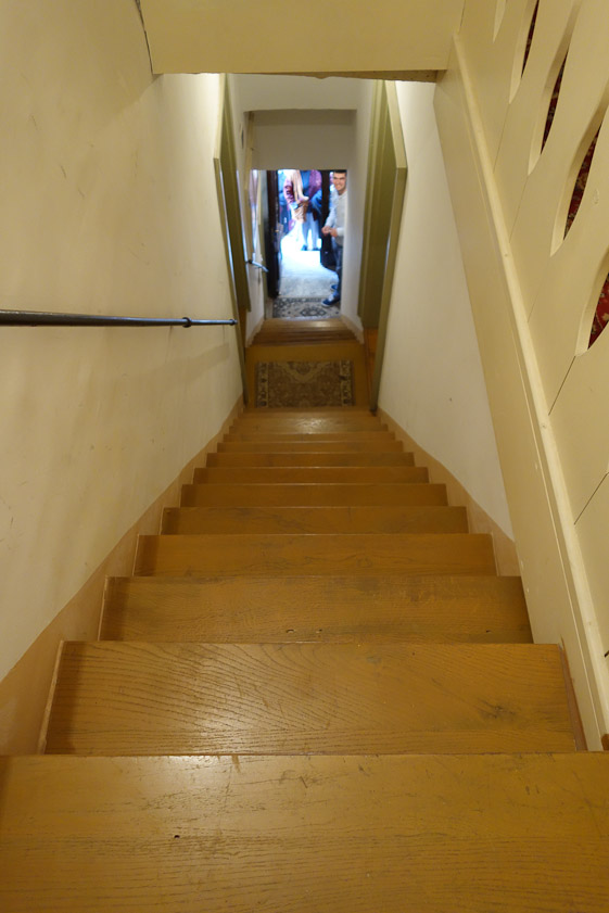 Two flights (27 steps) of steep stairs.