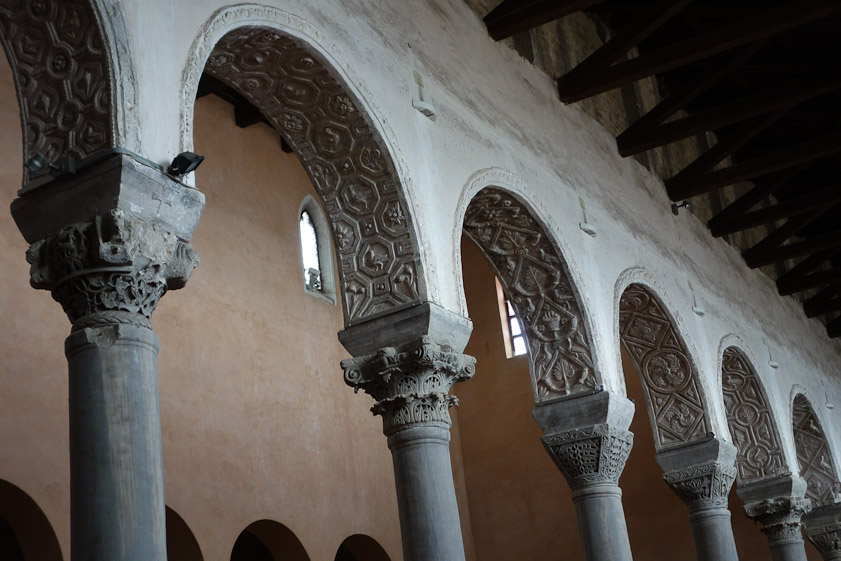 The varying styles of the capitals makes one think they were taken from different Roman ruins.