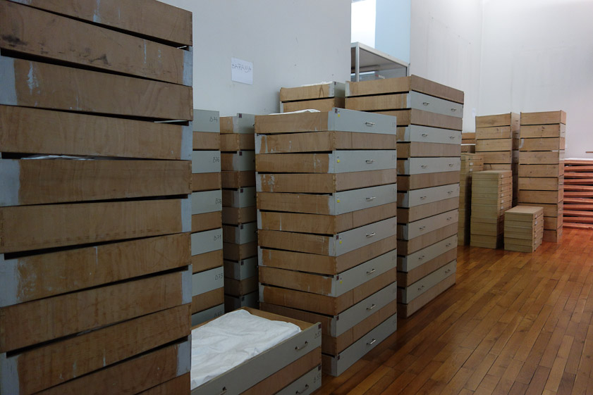 Trays holding artifacts removed from the floor above due to a roof leak at the Ethnographic Museum.
