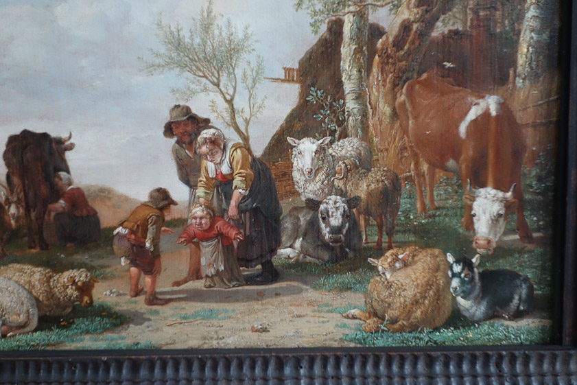 The livestock have better faces than that kid.