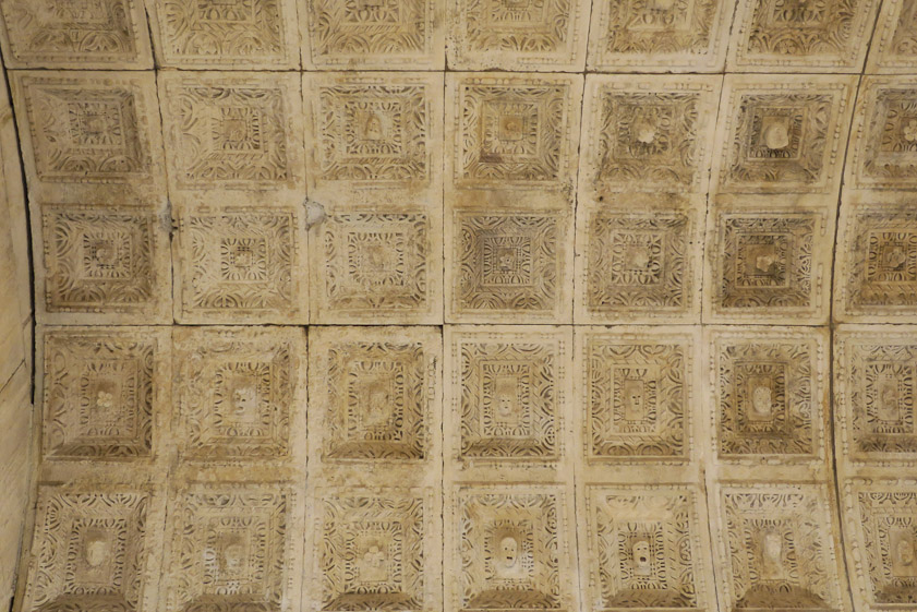 The temple has a coffered ceiling.