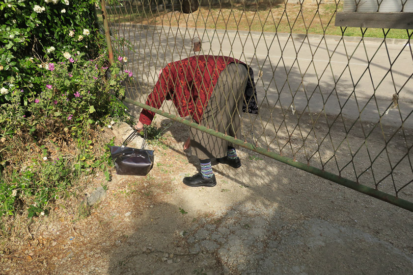 Returning to the palace via the waterfront, we had to scoot under a gate to get out.