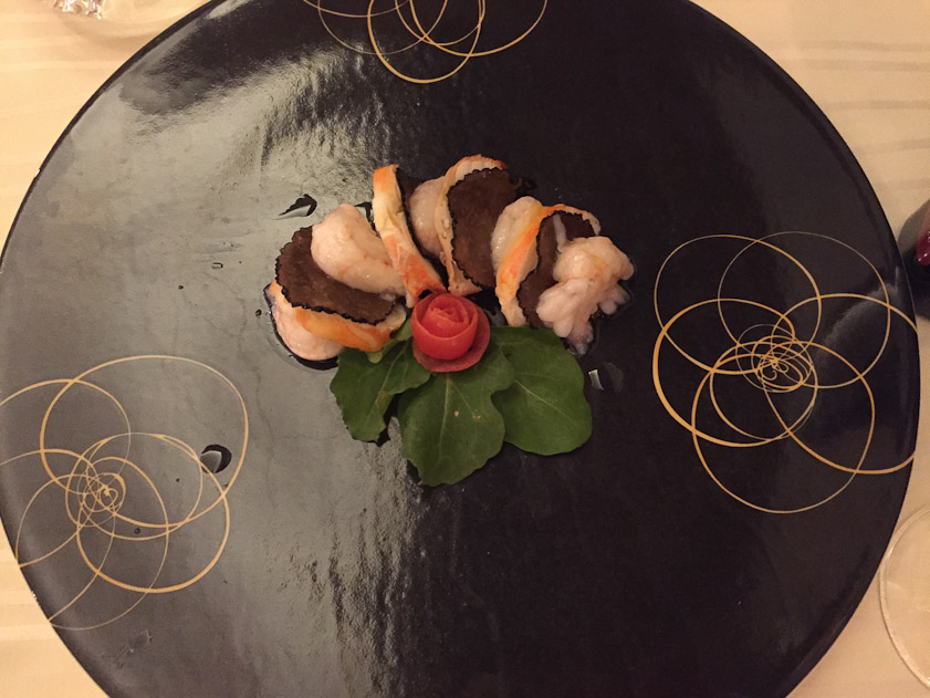 I think this was an appetizer consisting of slices of truffle, shrimp, and a fish. At Zinfandel's, the main restaurant at the Esplanade Hotel.