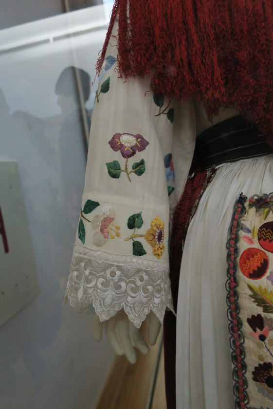 Sleeve with lace and embroidery.