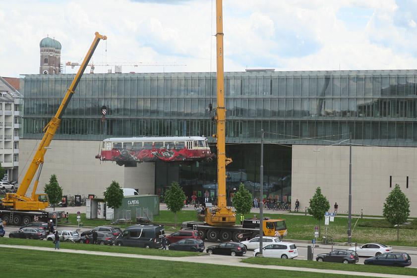 From the Alte Pinakothek we saw a graffiti-covered streetcar being mounted in front of the Hochschule fur Fernsehen und Film (School for TV and FIlm).