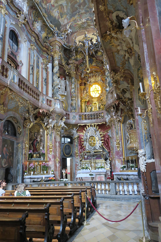 The interior of Asam Church (formally St. John Nepomuk) is thoroughly decorated.