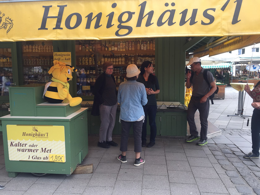 A stand selling many varieties of honey