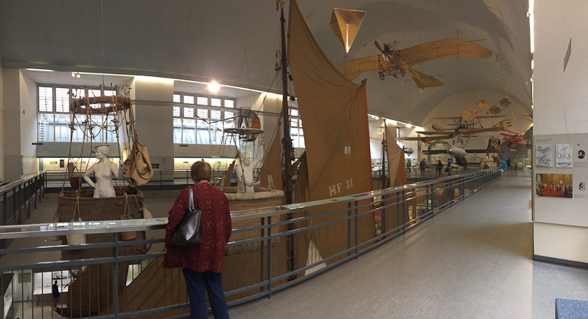 This gallery is two stories high, to accommodate the masts of a ship. It also shows early airplanes and dirigible artifacts.