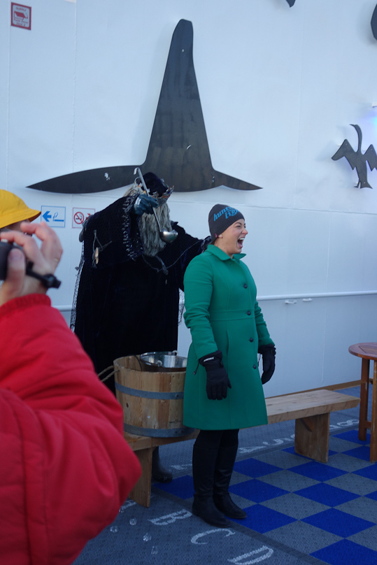 She began to yell even before the ice hit her skin. She'd buttoned her collar tightly, but not tight enough. After this, she got a shot of aquavit and a certificate for going north of the Arctic Circle.