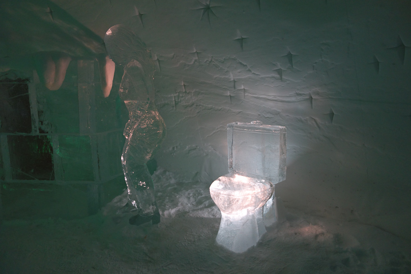 In the common room and bar at the end of the Snow Hotel was this sculpture of an ice toilet and and ice woman backing up to it.