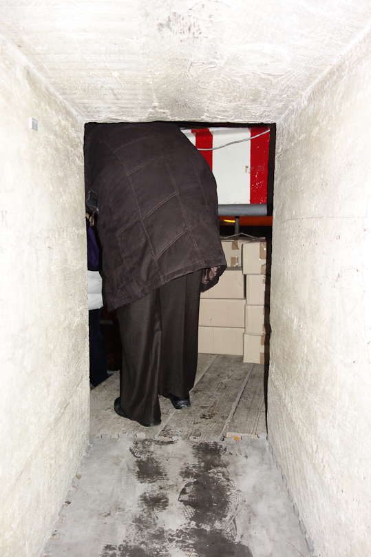 Most people just hunched over and shuffled in, but I moved on hands and knees. The walls are three feet thick.