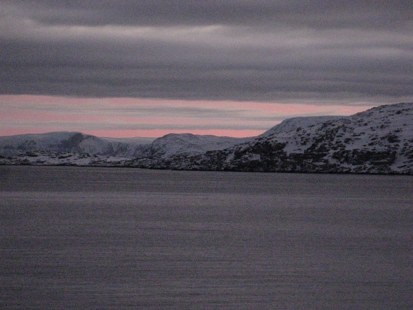 9:12 AM approaching Havøysund. I like the pink light reflecting off the water. Mariana took this with her old Canon PowerShot 930 IS. She couldn't find her newer, fancier Sony DSC-RX100 before we left. Our cameras both gave us plenty of trouble on this trip.