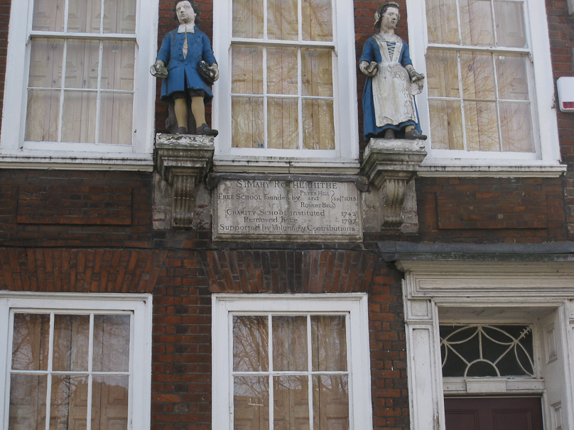 Driving back from Rotherhithe to Muswell Hill we passed quite a few attractive old buildings. These figures are on the facade of St. Mary Rotherhithe, a free school founded 1613 and moved here in 1797.