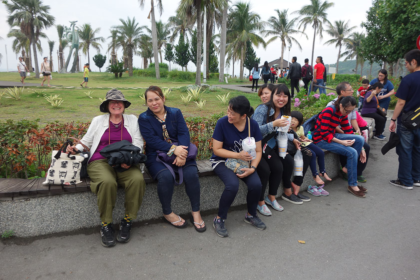 While we were eating ice cream sitting in a park on the sea side of Cijin, this group of girls sat down next to us.