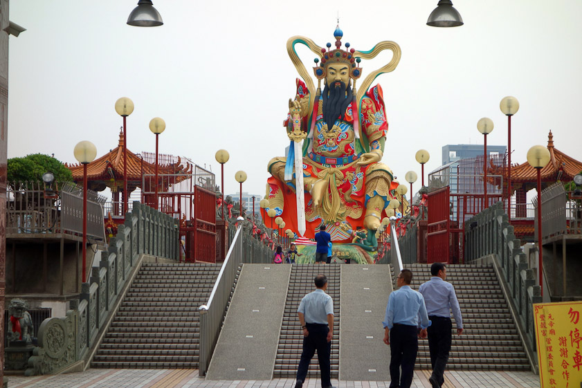 The statue of Xuanwu, god of th north is  at the end of a causeway on a small island in Lotus Pond.