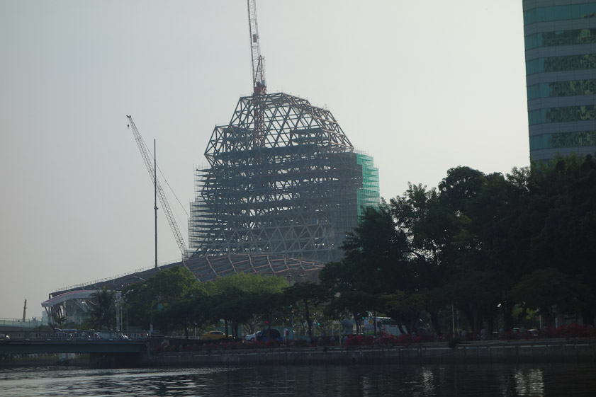 Something big is rising on the right bank of the Love River where it enters the harbor.