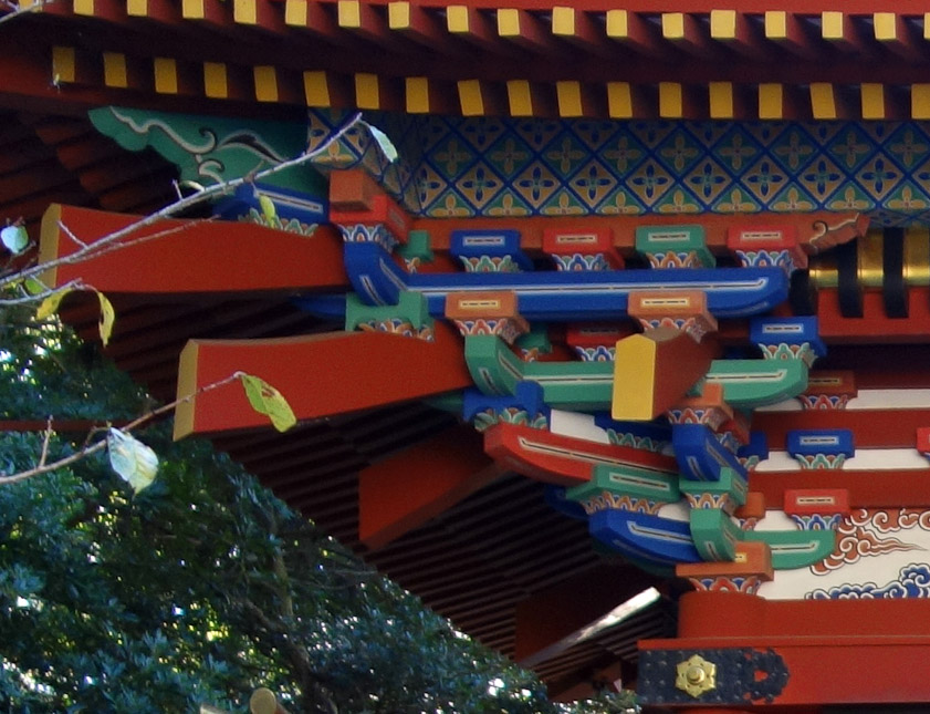 A blowup of the complicated set of brackets supporting the corner of the Roman gate roof.