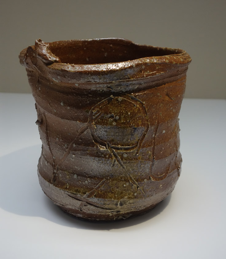 He worked with, among other potters, Peter Voulkos, who made this water container in the 1980s.