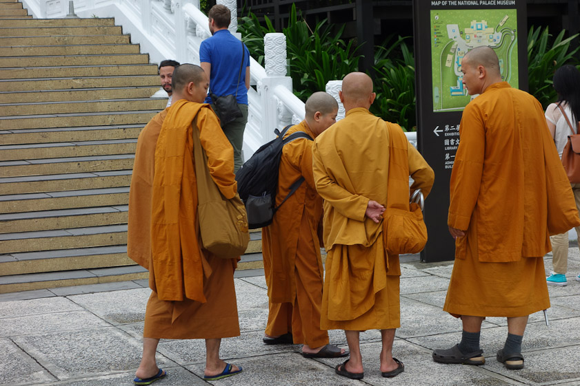 A group of monks about to visit the museum.