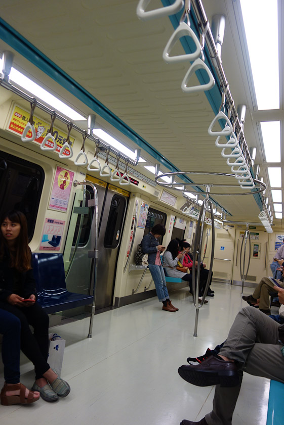The Taipei metro had fewer seats than the Washington Metro, but had WiFi and electronic displays over the door of progress.