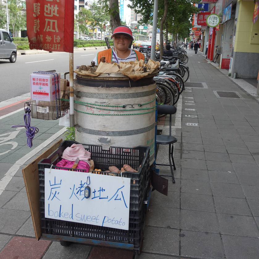 This portable oven baked sweet potatoes for immediate consumption. on the same corner where I shot the preceding photos.