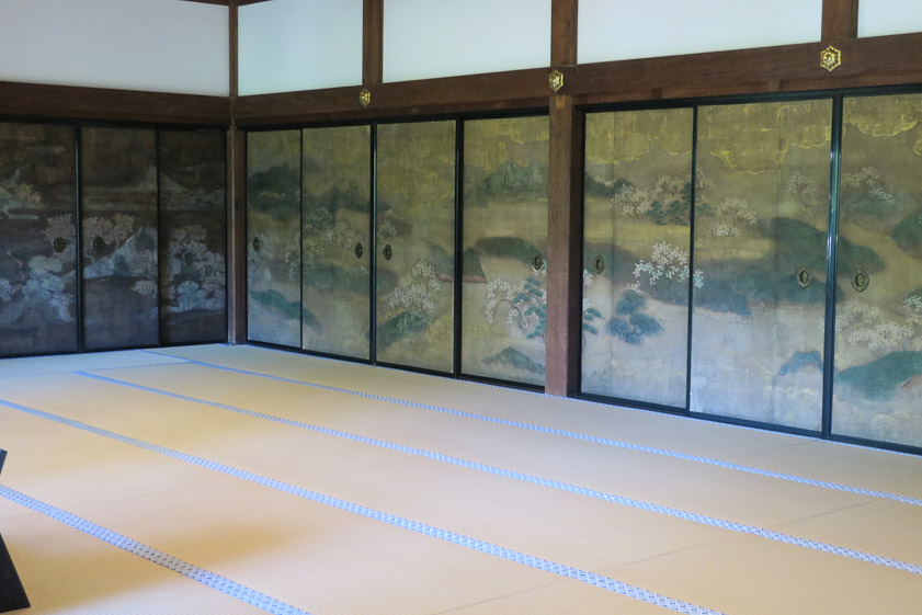 The residence has a lot of precious, old painted sliding screens.