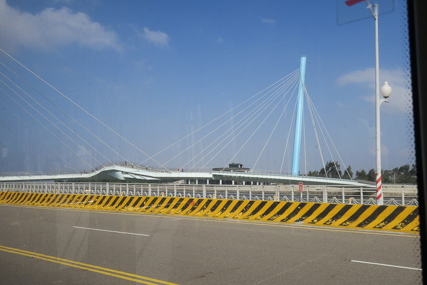 From the bus we photographed this cable stayed pedestrian bridge at Taichung port.